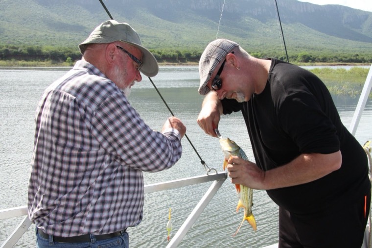 Anglers on a boat on Lake Jozini